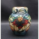 A Moorcroft pottery ginger jar and cover decorated in the Anna Lily pattern, impressed mark,
