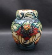 A Moorcroft pottery ginger jar and cover decorated in the Anna Lily pattern, impressed mark,