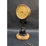 An early 19th century English gilt drum clock,