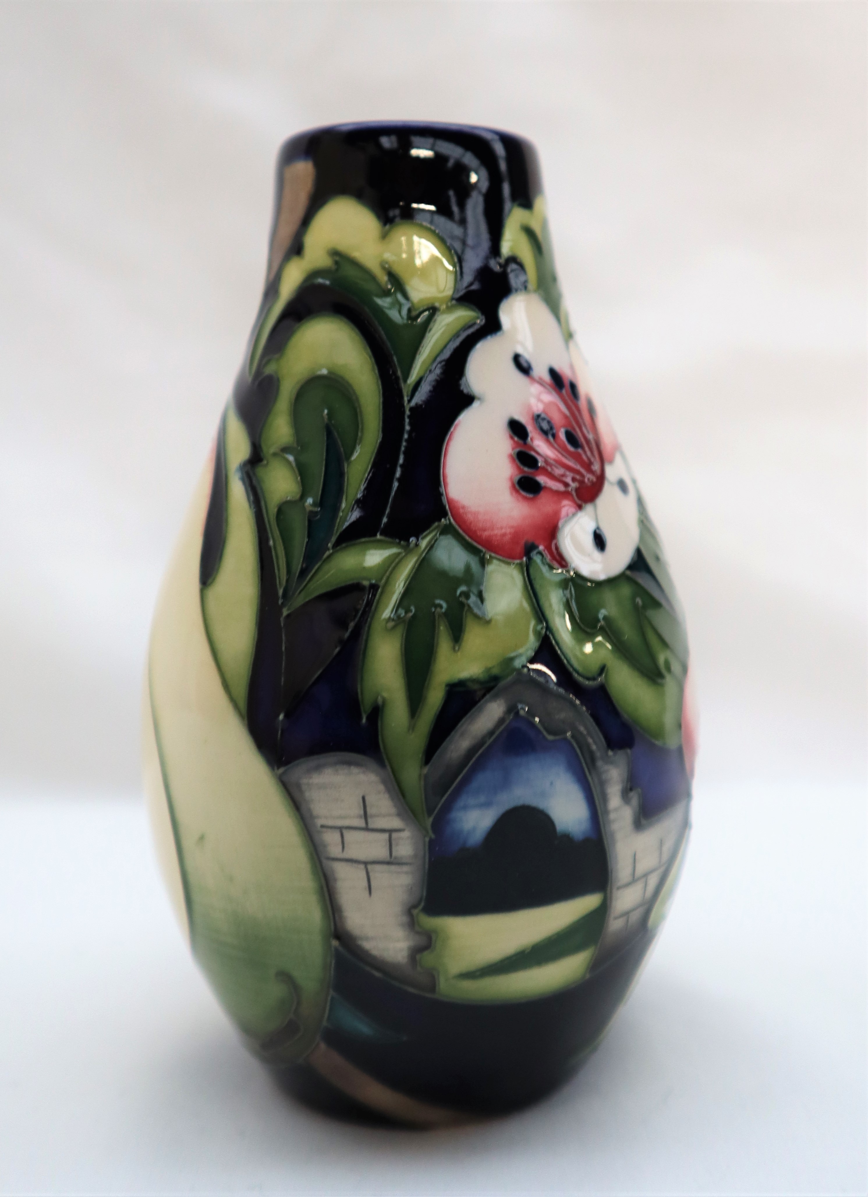 A limited edition Moorcroft pottery vase decorated with pears and flowers, dated 2010, - Image 3 of 5