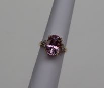 Gemporia - A Mawi Kunzite and Diamond 18k gold Tomas Rae collection ring, with an oval 8.