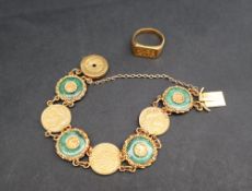 A Chinese yellow metal coin and jade set bracelet, with chain attachments,