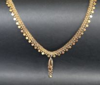 A 14ct yellow gold fringe necklace, approximately 40cm long,