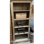 A pine bookcase together with a pine box,