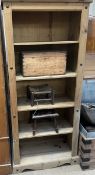 A pine bookcase together with a pine box,