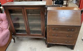 An Edwardian mahogany bureau together with a bookcase with a pair of glazed doors