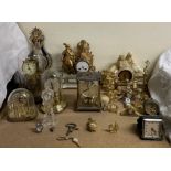 A gilt metal and alabaster mantle clock, together with anniversary clocks, plaster clock,