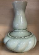 A celadon type vase,