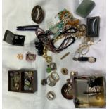 Assorted costume jewellery including brooches, watches, beaded necklaces,