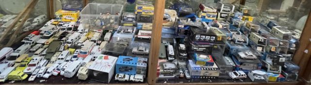 A large collection of boxed and unboxed model cars, vans etc including Hornby Maisto, Corgi, Scuco,