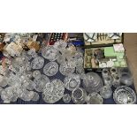 A large lot including glass decanters, glass bowls, glass vases,