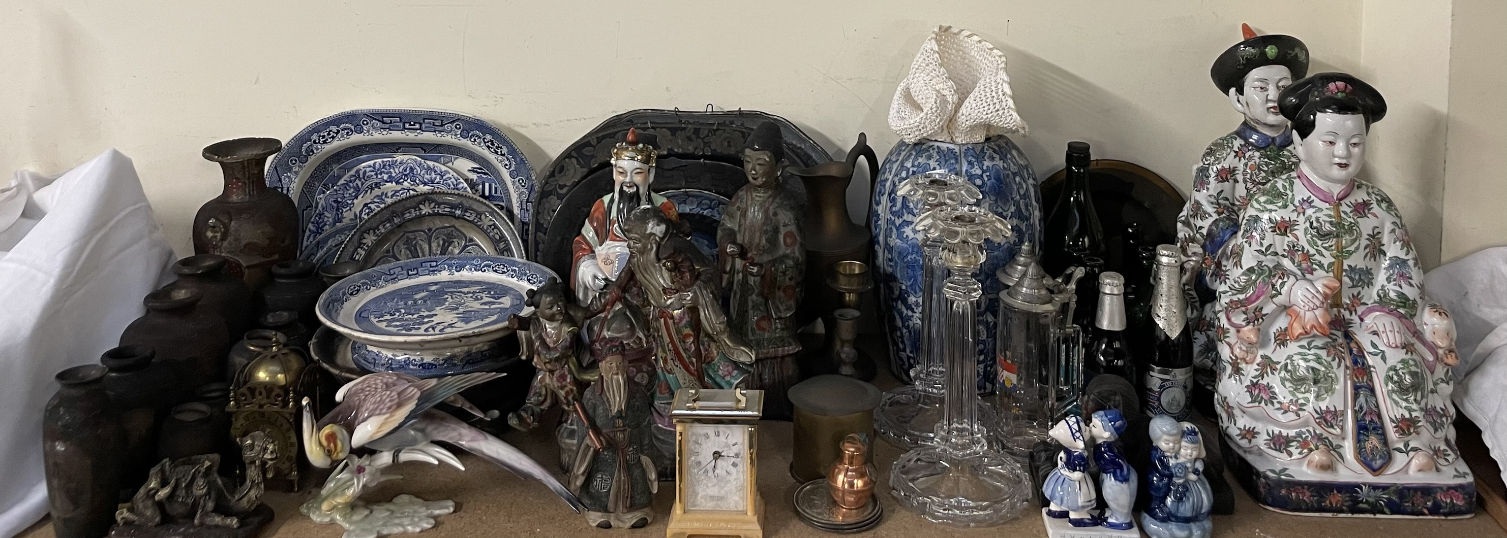 Assorted blue and white pottery plates, Japanese pottery vases, Chinese figures, glass candlesticks,