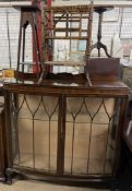 A 20th century mahogany display cabinet together with a bamboo magazine rack and an oak stand