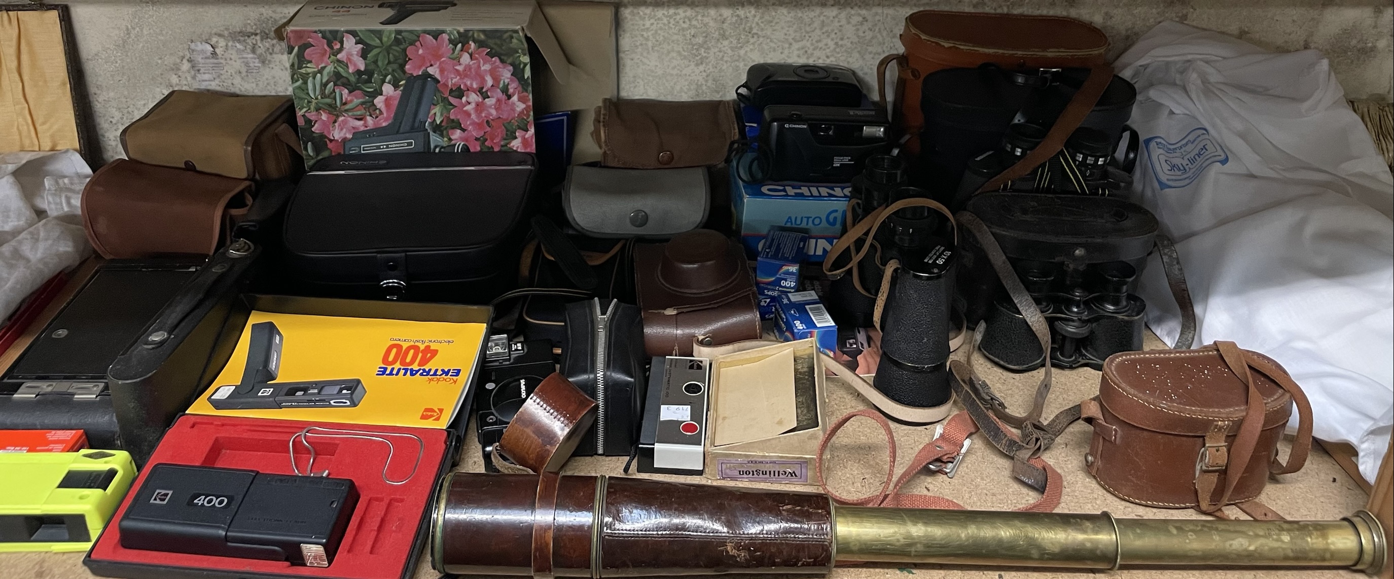 A Broadhurst Clarkson & Cobrass and leather three drawer telescope together with binoculars,