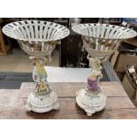A pair of 19th century porcelain table centrepieces, with a flared pierced basket,