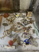 Assorted costume jewellery including rings, watches,