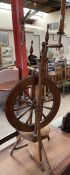 A spinning wheel, with tapering spokes and tradlke action stampled Hamilton, Edin..
