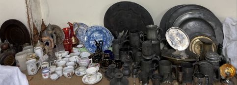 A collection of Pewter chargers, pewter tankards, electroplated wares, commemorative wares,