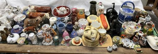 Pottery bulls together with a pottery bulldog, an Aynsley Orchard Gold part tea service, mugs,