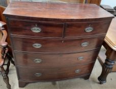 A George III mahogany chest of D shape with two short and three long drawers on bracket feet