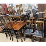 A mahogany extending dining table on cabriole legs together with a set of four ladder back chairs,