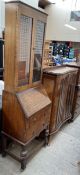 A 20th century walnut display cabinet together with a 20th century oak bureau bookcase