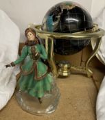 A gem set globe in a gilt metal stand,