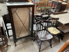 A set of four spindle back dining chairs together with a display cabinet