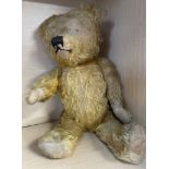 A mohair teddy bear with jointed limbs