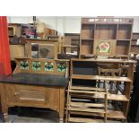 An Art Nouveau inspired pine washstand with a tiled back together with a pine hanging shelves,