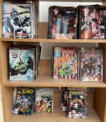 A collection of comics including 2000AD, X-Men, The Punisher,