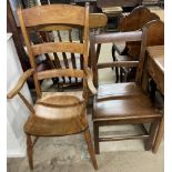 A kitchen ladderback elbow chair together with a provincial dining chair
