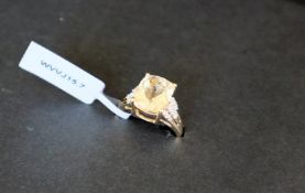 Gemporia - A serenite and white zircon 9k gold ring, set with a 3.