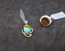 Gemporia - An ammolite and white zircon 9k gold pendant together with an ammolite and white zircon