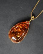 Gemporia - A Baltic cognac amber gold tone sterling silver necklace together with two Baltic cherry