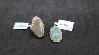 Gemporia - An aquaprase and white zircon 9k gold pendant together with an aquaprase and white