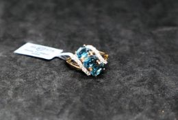 Gemporia - An orissa kyanite and white zircon 9k gold ring,