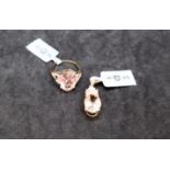 Gemporia - A champagne danburite and white zircon 9k gold pendant together with a rose danburite
