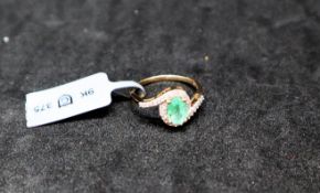 Gemporia - A Colombian emerald and white zircon 9k gold ring, size L to M,