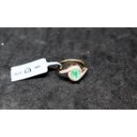 Gemporia - A Colombian emerald and white zircon 9k gold ring, size L to M,