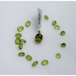 Gemporia - A red dragon peridot and white zircon 9k gold pendant together with ten oval brilliant