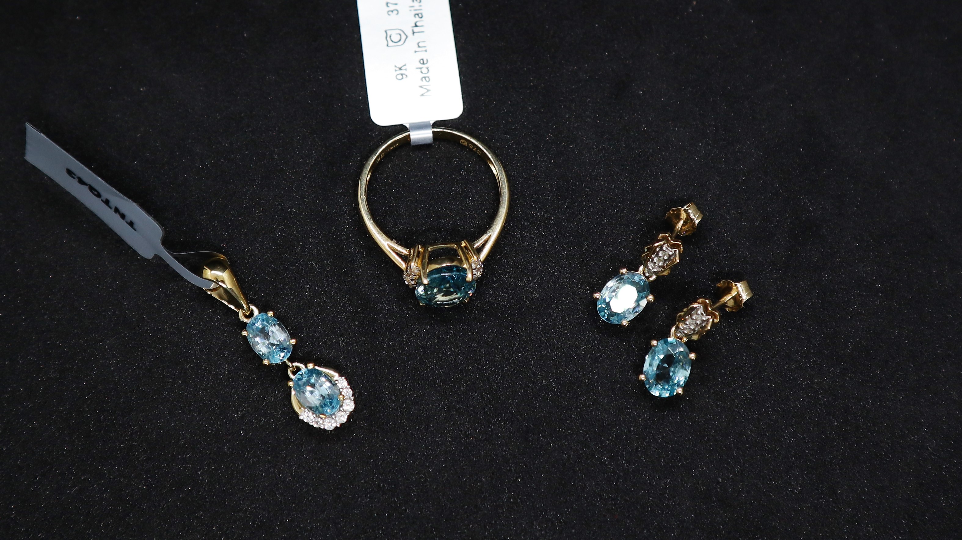 Gemporia - A pair of Ratanakiri blue zircon and diamond 9ct gold earrings together with a