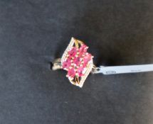 Gemporia - A Burmese ruby and white zircon 9k gold ring, size N to O,