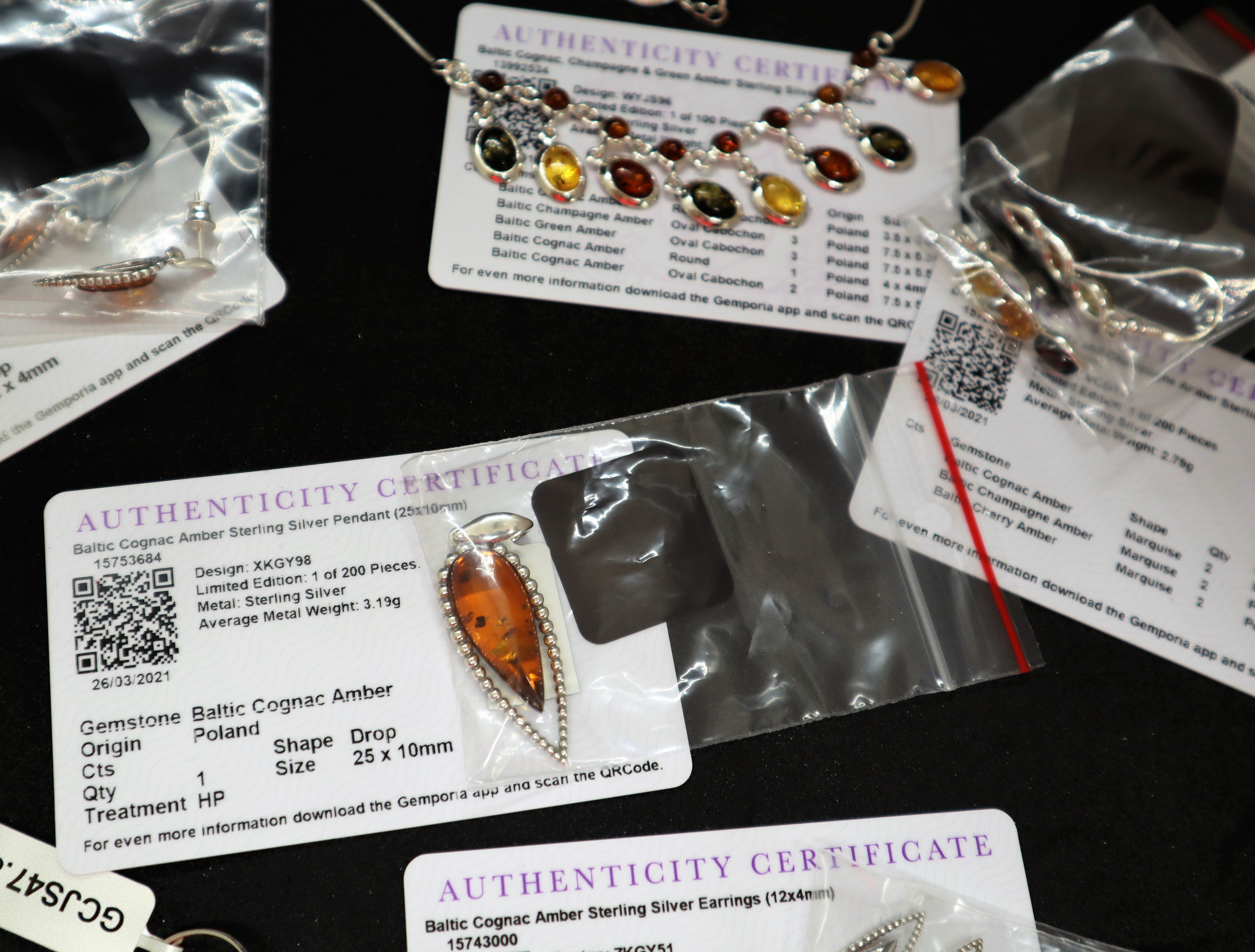 Gemporia - A Baltic cognac amber sterling silver pendant together with three pairs of Baltic cognac - Image 2 of 3