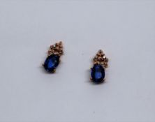 Gemporia - A pair of nilamani and diamond 9k rose gold earrings