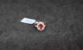 Gemporia - A rose apatite and white zircon 9k gold ring,