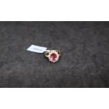 Gemporia - A rose apatite and white zircon 9k gold ring,