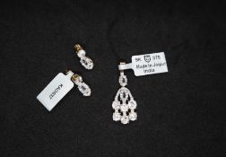 Gemporia - A pair of Singida Tanzanian and white zircon earrings with 4.