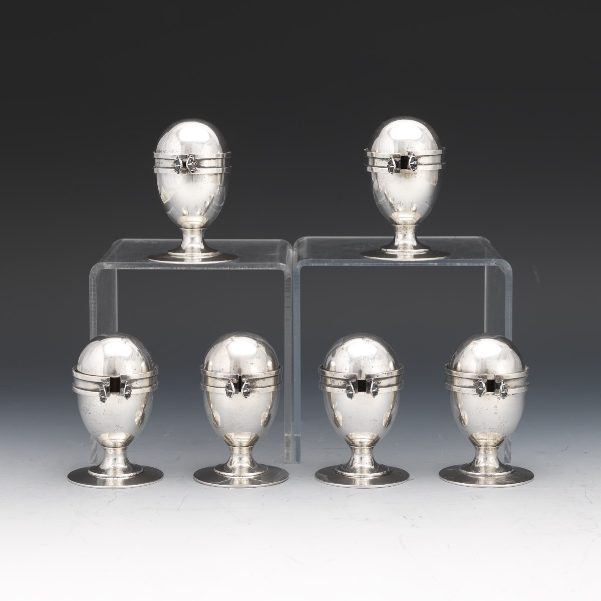 Six Edwardian Sterling Silver with Gold Wash Egg Holders with Topping Brackets - Image 2 of 8