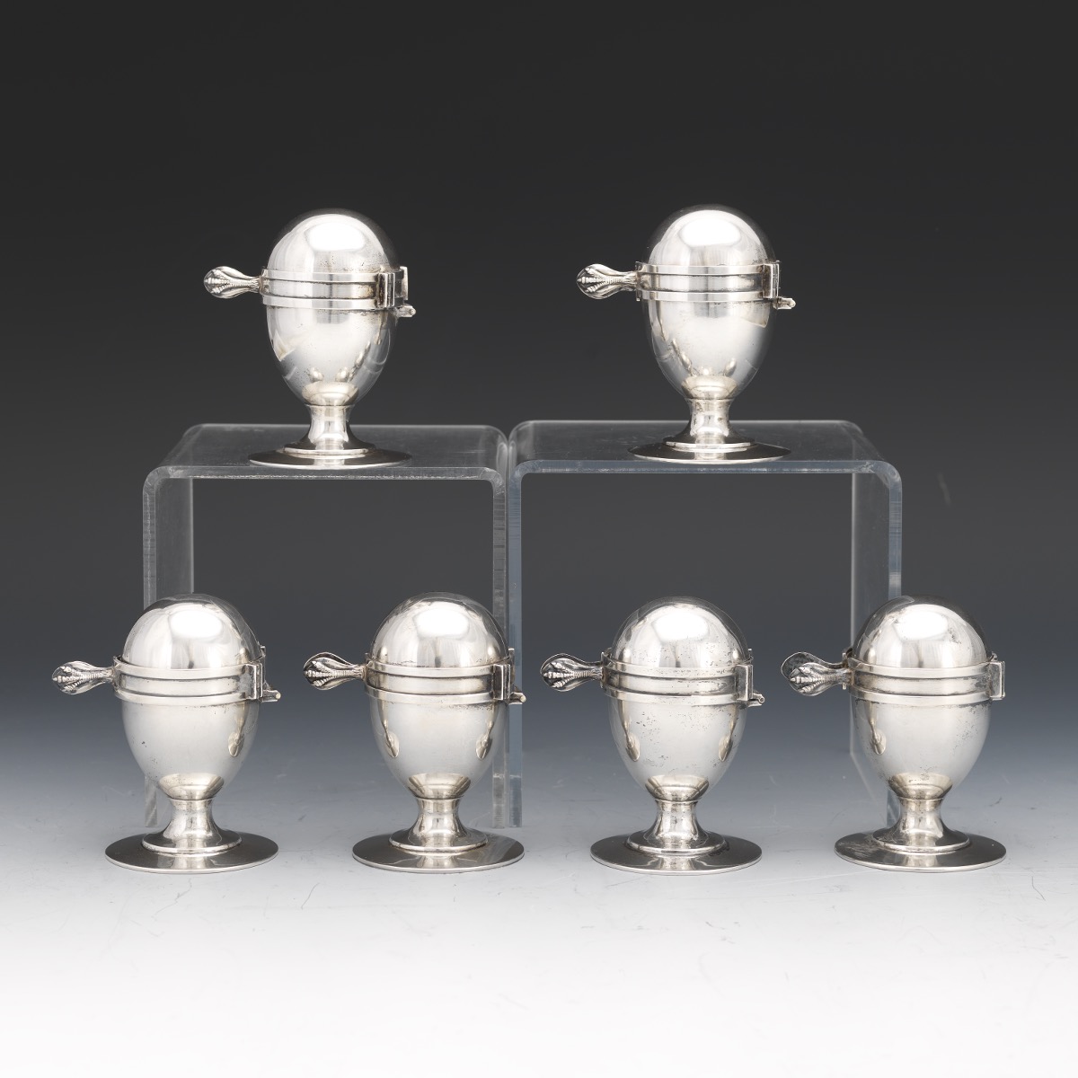 Six Edwardian Sterling Silver with Gold Wash Egg Holders with Topping Brackets - Image 3 of 8